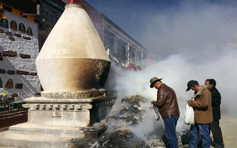 dispel evil spirits with fire and smoke