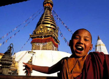 a little monk and BoudhaNath Stupa a little monk and BoudhaNath Stupa