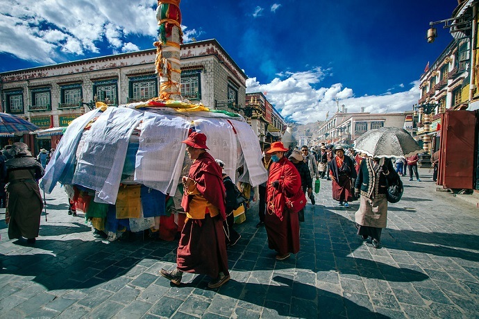 Pilgrims are circumambulating around the Jokhang temple. Pilgrims are circumambulating around the Jokhang temple.