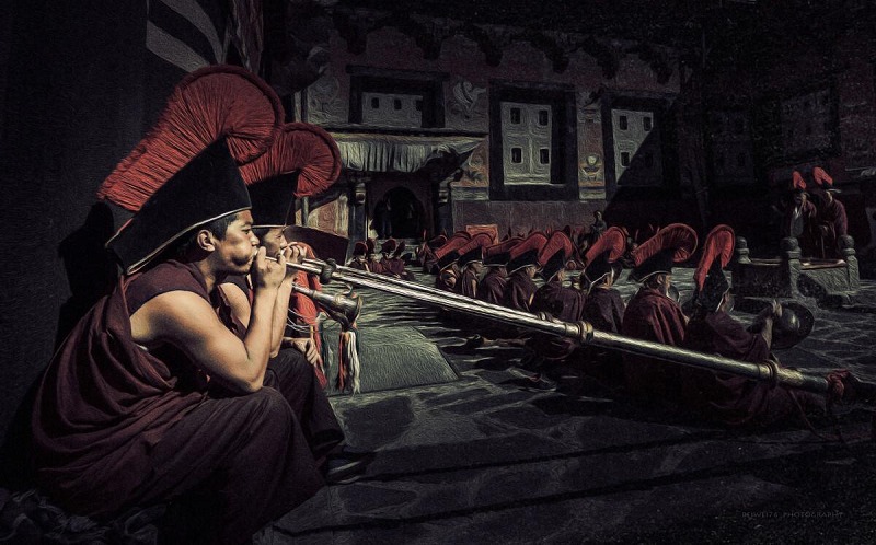 Tibetan monks play Tibetan copper titaniums at Sakya Monastery.